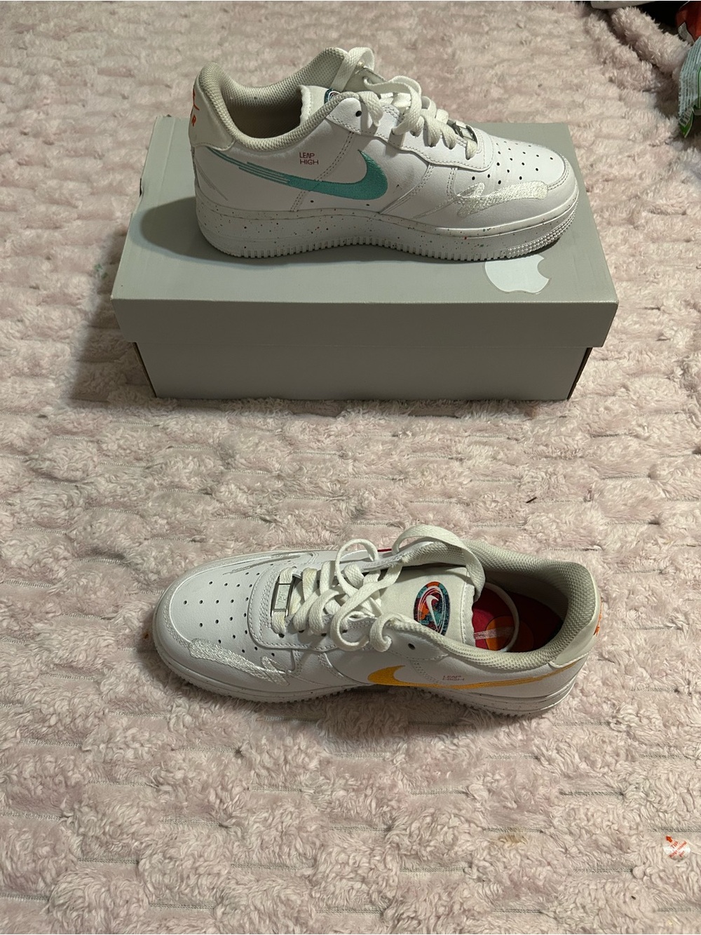 Nike Kids White Leather Sneakers with Teal and Yellow Swooshes